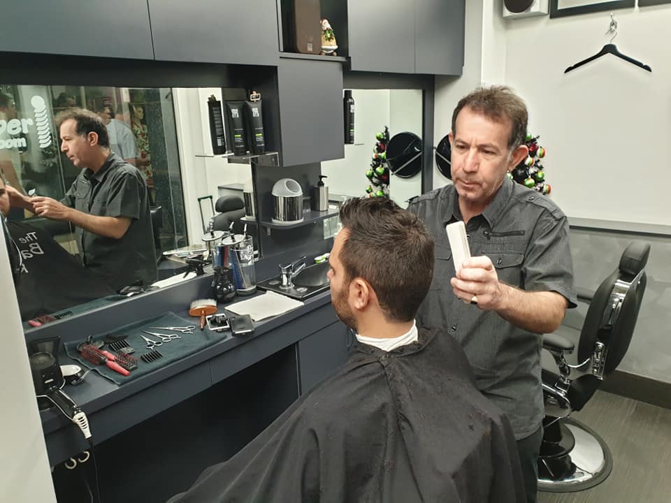 younger customers modelling their latest and great modern hair styles by the guys at the Brisbane city 'The Barber room'